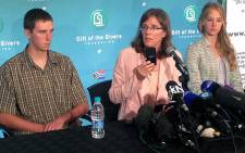 Pieter-Ben, Yolande and Lize-Marie Korkie address the press after Pierre Korkie's body arrived in South Africa on 9 December 2014. Picture: Vumani Mkhize/EWN.
