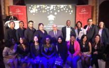 Western Cape Minister of Social Development Albert Fritz, centre back, is seen among the 16 people who had received bursaries from the Grandwest CSI Bursary Fund. Picture: www.westerncape.gov.za.