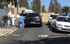 FILE: Police and forensic experts comb the scene of a shooting after prominent advocate Pete Mihalik was gunned down outside a Cape Town school on 30 October 2018. Picture: Kaylynn Palm/Eyewitness News