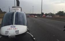 FILE: ER24 helicopter on the M1 after the collapse of temporary (Grayston) bridge. Picture: Twitter @ER24EMS.