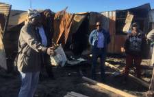 Western Cape Human Settlements MEC Bonginkosi Madikizela visits the Masiya informal settlement on 3 June 2018, after a shack fire killed five children. Picture: Supplied