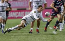 FILE: Toulouse's South African flanker Rynhardt Elstadt (C) tries to catch the ball during the French Top14 rugby union match between Stade Francais Paris and Stade Toulousain Rugby (Toulouse) at the Jean-Bouin stadium in Paris, on 6 March 2022. Picture: Geoffroy VAN DER HASSELT/AFP