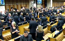 Democratic Alliance MPs walk out of Parliament during the 2015 State of the Nation Address on 12 February.