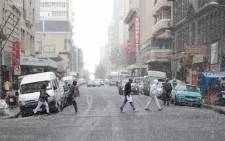 Snow falls in the Johannesburg CBD after most parts in country reported cases of heavy falls on 7 August 2012. Picture: Po-Chuan You/iwn.