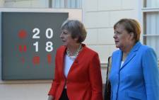 Britain's Prime Minister Theresa May (L) and German Chancellor Angela Merkel arrive at the Mozarteum University to attend a plenary session part of the EU Informal Summit of Heads of State or Government in Salzburg, Austria, on 20 September 2018. Picture: AFP