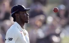FILE: England’s Jofra Archer heads back to his mark to bowl during the third day of the first Test cricket match between England and New Zealand at Bay Oval in Mount Maunganui on 23 November 2019. Picture: AFP.