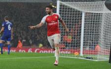 Arsenal’s Olivier Giroud and Laurent Koscielny helped their team to beat Everton 2-1 in the English Premier League on 24 October 2015. Picture: Arsenal official Facebook page.