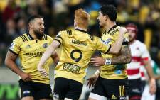 Wellington Hurricanes players celebrate their victory against Lions. Picture: @Hurricanesrugby/Twitter. 
