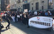Nurses gathered at Church Square in Pretoria ahead of a protest for better pay and working conditions. Picture: Masego Rahlaga/EWN.