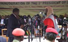 Emmerson Mnangagwa is sworn in as Zimbabwe's new president in Harare on 24 November 2017. Picture: AFP.
