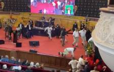 FILE: Armed members of the president's protection unit reacted quickly in the Cape Town City Hall on Thursday evening, after EFF leader Julius Malema and others mounted the stage where the president was seated. Picture: @ewnreporter/Twitter