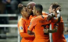 Netherlands forward Ryan Babel (second from left) celebrates a goal with his teammates during their Euro 2020 qualifier against Estonia on 9 September 2019. Picture: @UEFAEURO/Twitter