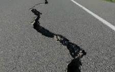 FILE: The road damage following an earthquake. Picture: AFP.  