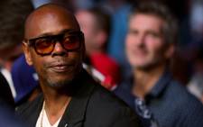 In this file photo taken on 10 July 2021 Dave Chappelle looks on during UFC 264: Poirier v McGregor 3 at T-Mobile Arena in Las Vegas, Nevada. Picture: Stacy Revere/AFP