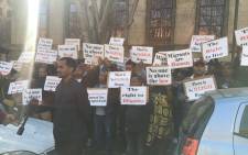 Foreign nationals picketing outside the Joburg Magistrate's Court on Monday, 12 August 2019 in solidarity of their fellow migrants who were arrested during last week's Joburg raids. Picture: Edwin Ntshidi/EWN