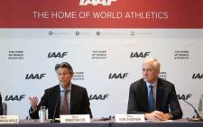 FILE: International Association of Athletics Federations (IAAF) President Sebastian Coe (L) and Independent chairperson of the IAAF Taskforce for Russia Rune Andersen hold a press conference in Monaco on 4 December 2018. The governing body of world athletics on 4 December maintained Russia's ban from track and field over mass state-backed doping, citing two conditions before the powerhouse can return to international competition. Picture: AFP