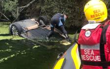A woman was found dead in a car that was found semi-submerged in Hartebeesport Dam on 8 May 2021. Picture: @NSRI/Twitter.

