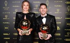 Spain and Barcelona's Alexia Putellas (left) and Argentina captain and Paris Saint-Germain player Lionel Messi (right) with their 2021 Ballon d'Or awards. Picture: @francefootball/Twitter