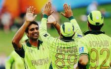 Pakistani players celebrate a wicket during their World Cup ODI match against the UAE on 4 March 2015. Picture: CWC website.