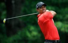Tiger Woods said he pulled out of the tournament because he was still having problems with his aching back. Picture: AFP.