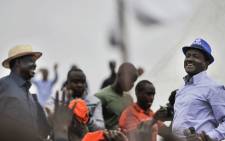 FILE: Kenya's opposition leader Raila Odinga (L). Picture: AFP.
