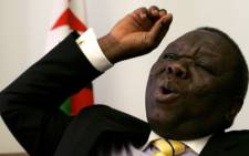FILE: Zimbabwe Prime Minister and MDC leader Morgan Tsvangirai pictured on March 15, 2013 talking to church leaders about upcoming elections. Picture: AFP/JEKESAI NJIKIZANA