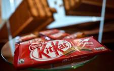 A pack of the chocolate-covered wafer biscuit bar KitKat brand from Swiss food giant Nestle. Picture: AFP.
