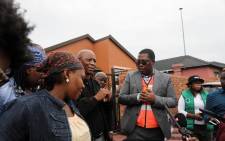Acting Gauteng Social Development MEC Panyaza Lesufi on 31 March 2020 met with the family of Ellen Mbhele (66) who died just outside a Sassa pay point in Pimville, Soweto, on 30 March 2020. Picture: Kayleen Morgan/EWN.