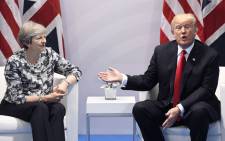 FILE: Britain's Prime Minister Theresa May and US President Donald Trump. Picture: AFP