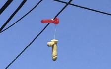 Hundreds of phallic sex toys have been seen hanging in recent days from power lines across Portland, Oregon, provoking laughter, blushing and lots of photos. Picture: Twitter ‏@BoingBoing.