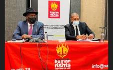Minister of Police Bheki Cele (left) testifying at the national investigative hearing into the July 2021 unrest taking place in Sandton on 21 February 2022. Picture: SAHRC. 