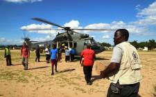 The World Food Programme loads a helicopter with emergency food aid to be delivered to isolated villages in Nsanje District on 23 January 2015. Picture: Aletta Gardner/EWN.