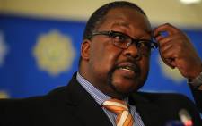 Police Minister Nkosinathi Nhleko speaks at the release of the 2013/2014 annual crime statistics in Pretoria on 19 September 2014. Picture: Sapa.