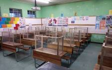 FILE: Classroom desks at Talfalah Primary School, in Cape Town, are fitted with handmade COVID-19 protective screens. Image: Supplied