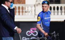 Belgian rider Remco Evenepoel of Deceuninck-Quick Step team arrives on stage at the Castello del Valentino (Valentine Castle) in Turin, on 6 May 2021 for the opening ceremony of the presentation of participating teams and riders, two days ahead of the departure of the Giro d'Italia 2021 cycling race. Picture: Luca Bettini/AFP