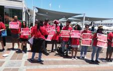 American students who were due to tour Robben Island joined a picket held by workers who demanded a 9% salary increase on 8 January 2019. Picture: Supplied.