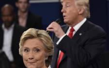 US Democratic presidential nominee Hillary Clinton and Republican presidential nominee Donald Trump participate in a town hall debate at Washington University in St Louis, Missouri, on 9 October 2016. Picture: AFP.