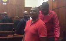Three men arrested in connection with the violence at the Moses Mabhida Stadium leaving the Durban Regional Court after being granted bail. Picture: Ziyanda Ngcobo/EWN