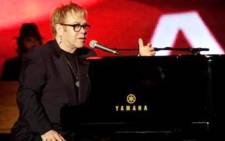 Elton John performs on stage at the 2010 MusiCares Person of the Year Tribute to Neil Young at the Los Angeles Convention Centre. Picture: AFP
