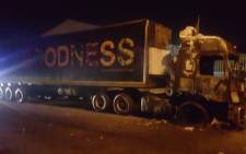 A truck that was set alight on Tuesday night during a protest on the N2 in George. Picture: SAPS