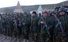 FILE: Iraqi Kurdish Peshmerga fighters gather in Iraq. Picture: AFP.
