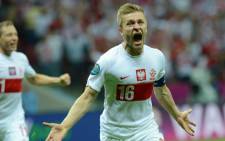 Jakub Blaszczykowski celebrates after scoring a stunning goal against Russia at the Euro 2012. Picture: AFP
