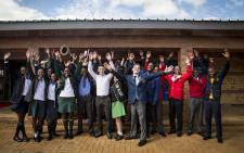 Gauteng's top achieving matric pupils throw their hands in the air after their awards ceremony in Daveyton on 5 January 2017. Picture: Reinart Toerien/EWN