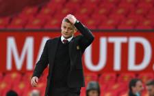 Manchester United manager Ole Gunnar Solskjaer walks off the pitch at the end of the game during the English Premier League football match between Manchester United and Tottenham Hotspur at Old Trafford in Manchester, north west England, on 4 October 2020. Picture: AFP