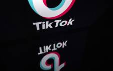 This file photo taken on 21 November 2019 shows the logo of the social media video sharing app Tiktok displayed on a tablet screen in Paris. Picture: AFP