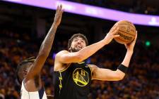 Klay Thompson #11 of the Golden State Warriors drives to the basket against Reggie Bullock #25 of the Dallas Mavericks during the third quarter in Game Five of the 2022 NBA Playoffs Western Conference Finals at Chase Center on 26 May 2022 in San Francisco, California. Picture: Ezra Shaw/Getty Images/AFP