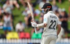 New Zealand's Kane Williamson celebrates 50 runs during day four of the second cricket Test match between New Zealand and England at the Basin Reserve in Wellington on 27 February 2023. Picture: Marty MELVILLE/AFP