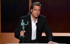 US actor Brad Pitt accepts the awards for best male actor in a supporting role during the 26th Annual Screen Actors Guild Awards show at the Shrine Auditorium in Los Angeles on 19 January 2020. Picture: AFP