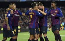Barcelona's Spanish defender Jordi Alba celebrates with teammates after scoring during the Uefa Champions League group B match Barcelona against Inter Milan at the Camp Nou stadium in Barcelona on 24 October, 2018. Picture: AFP.