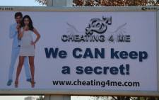 Cheating4me.com has paid for billboard space in Sandton, which seemingly takes a shot at Ashley Madison. Picture: Phumlani Pikoli/EWN